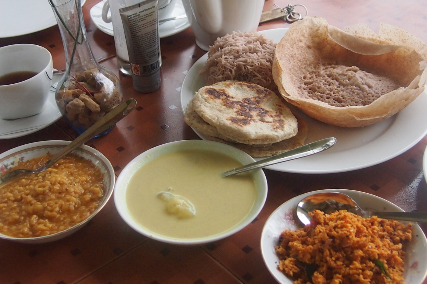 hoppers with curry on the breakfast table