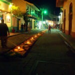 Good Friday Procession, Easter in Flores Guatemala Street scene in Flores Guatemala at night flower carpets and candles
