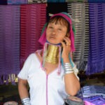 Long Neck Karen Women of Northern Thailand Long Neck Woman Brass Rings around her neck in a Hill Tribe village in north Thailand
