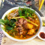 Eating Bun Bo Hue in Hue Variation on Bun Bo Restaurant Dish