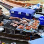 Amphawa floating market seafood fish prawns crabs