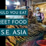 Should You Eat Street Food in Southeast Asia Street food stall in Southeast Asia, text reads "Should You Eat Street Food in S E Asia