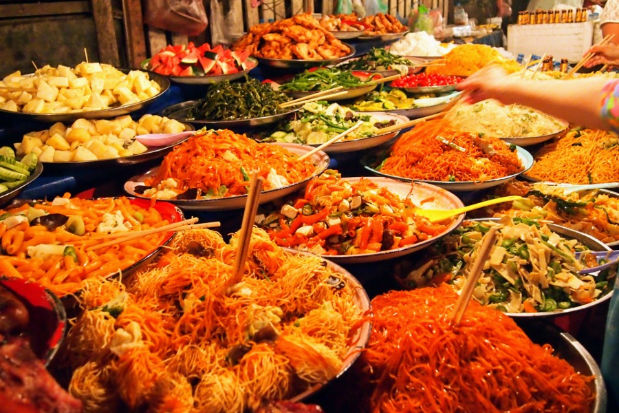 Photo of a street food buffet at a night market in Laos